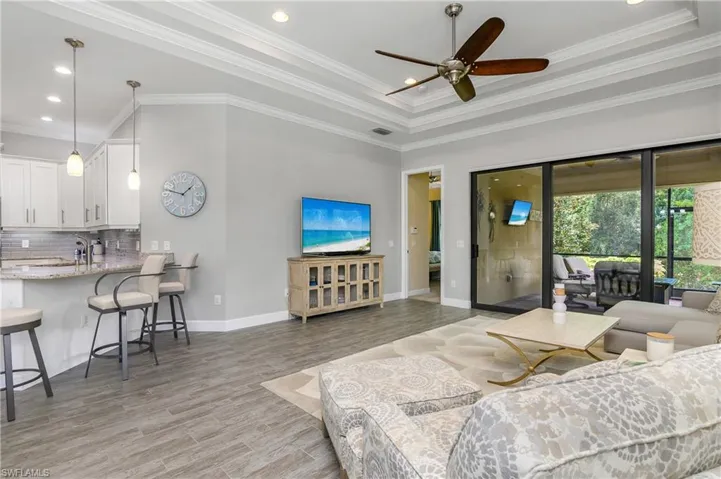 Gather with family and friends in this comfortable, open great room with lots of windows and natural light.
