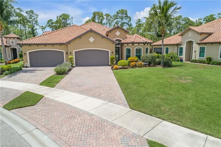 This home boasts one of the largest lots and driveways in the community.