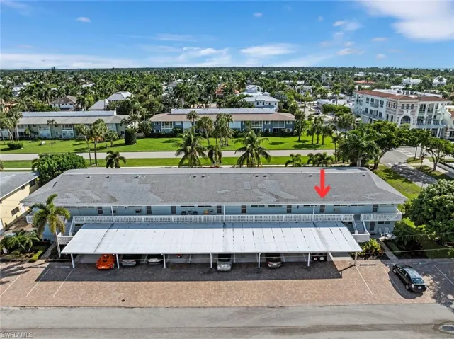 Birds eye view of property showing rear entrance and carport