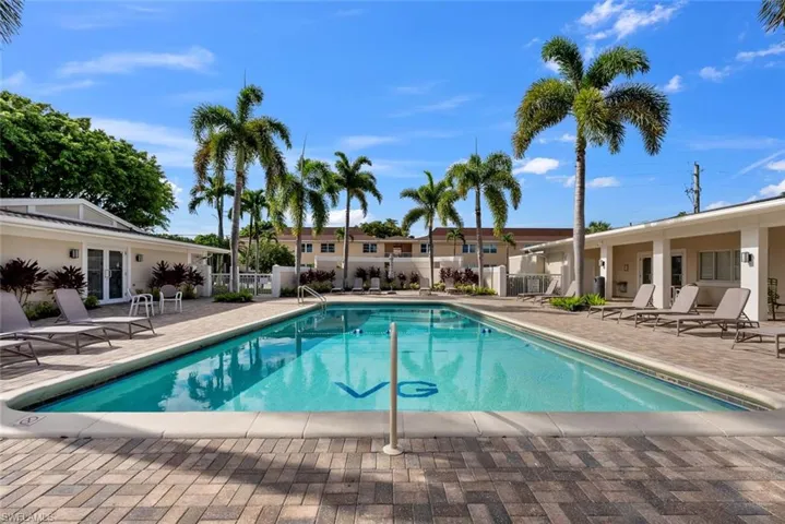 View of community pool with a patio