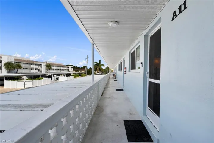 View of balcony overlooking carports at rear access
