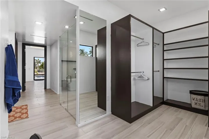 Bathroom with hardwood / wood-style floors