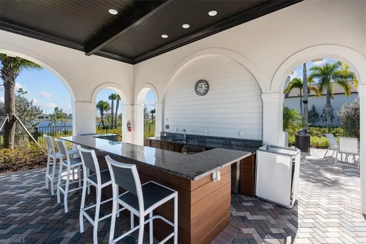 View of patio featuring an outdoor wet bar