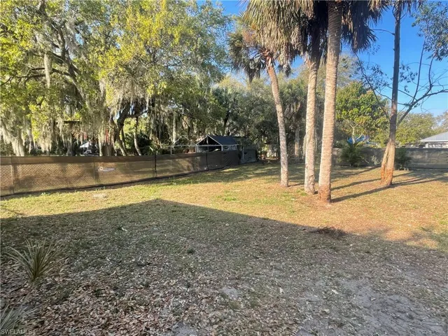 View of yard featuring view of wooded area