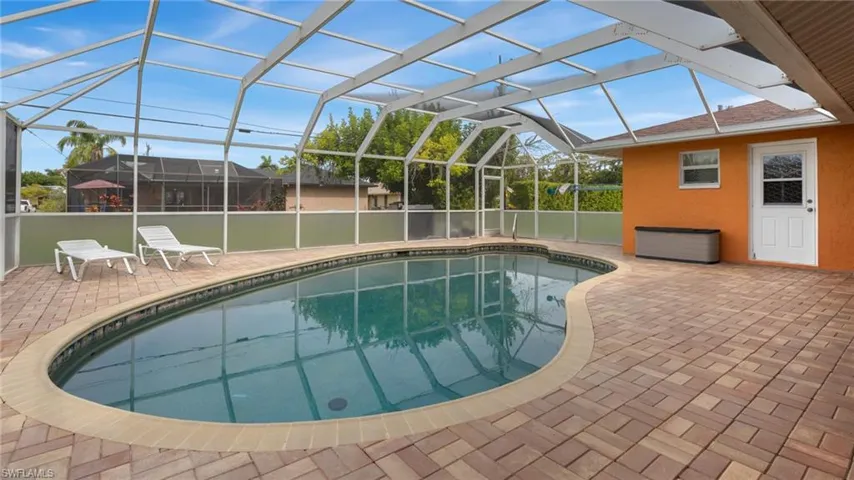 Step outside and experience your beautiful pool and pavered patio!