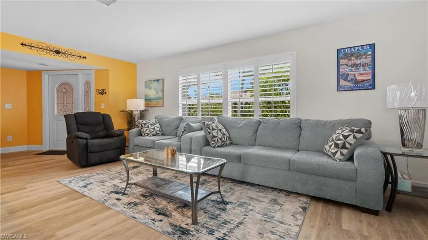 Luxury plank vinyl flooring throughout living areas.