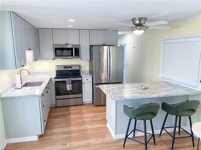 Kitchen with quartz counters and high end stainless appliances