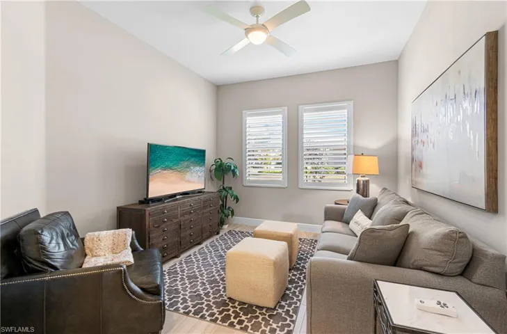 HUGE DEN WITH A LAZY BOY QUEEN SLEEPER SOFA INCLUDING BLINDS ON THE FRENCH DOOR CREATING A 4TH BEDROOM! PLENTY OF ROOM FOR ALL THE FAMILY! THEY'LL ENOY THEIR OWN T.V. ROOM THAT IS BEAUTIFULLY DECORATED WITH QUALITY FURNISHINGS!
