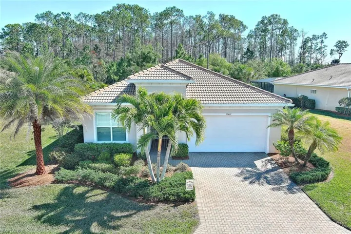 POOL HOME IN PARADISE WITH IMPACT WINDOWS & DOORS PLUS AMAZING LANDSCAPING!