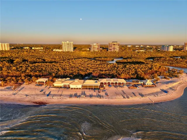 Aerial Sunset View of Pelican Bay Private Beach and Beach Club