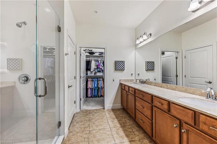 Primary Bath w/stone counters, frameless shower