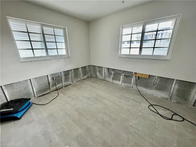 Unfurnished room with light hardwood / wood-style floors