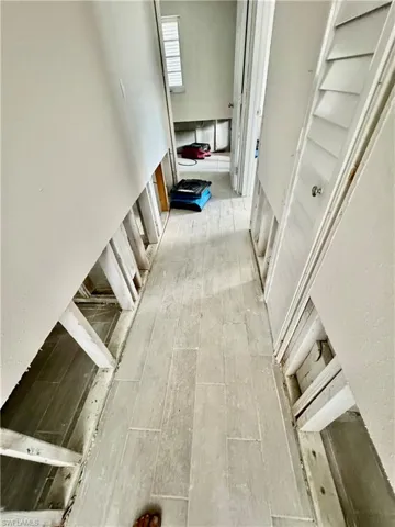 Hall featuring light hardwood / wood-style flooring