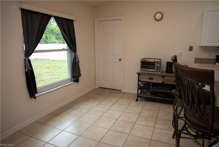 Bedroom featuring light wood-style floors and a ceiling fan