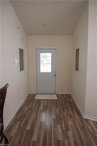 Full bath with a sink and light tile patterned floors