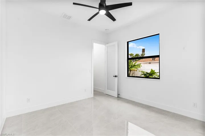 Unfurnished room with ceiling fan