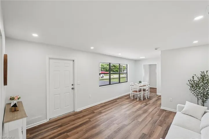 Living area featuring recessed lighting and wood finished floors