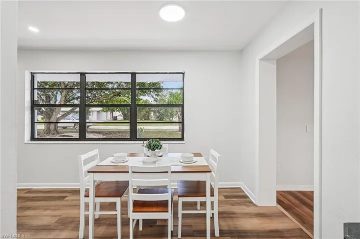 Dining space featuring wood finished floors