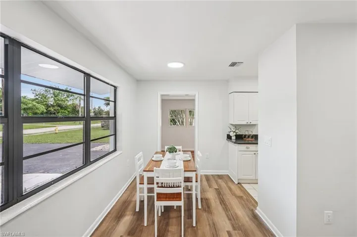 Dining space with light wood finished floors