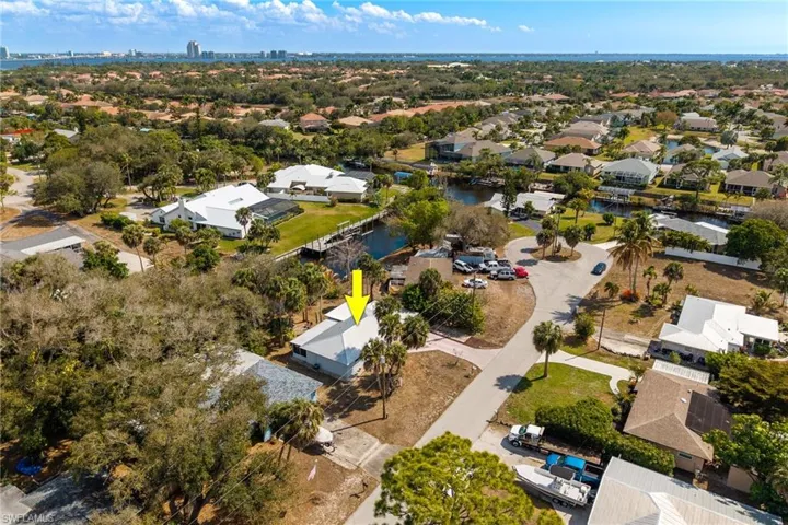 Aerial view of residential area with a nearby body of water