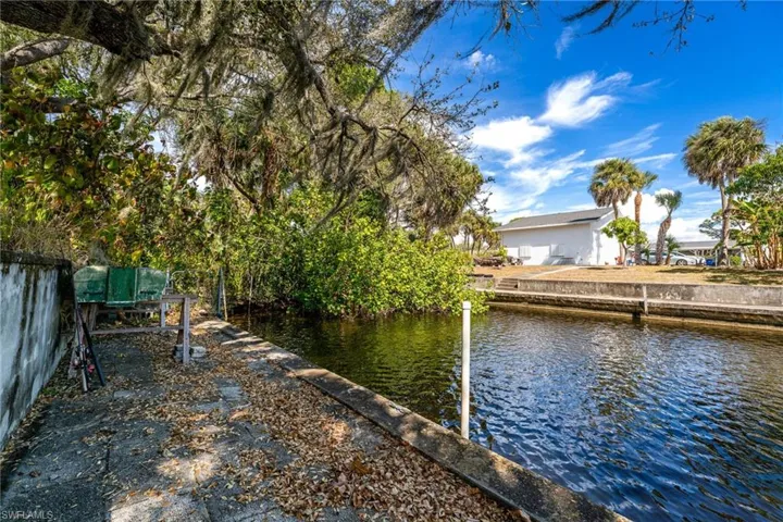 Dock featuring a water view