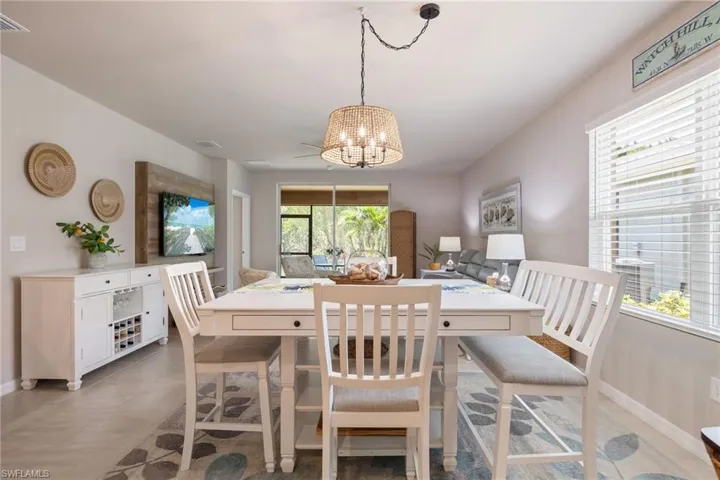 Open-concept living area with wood-finish flooring