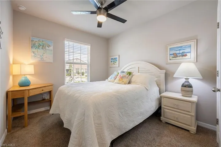 Bedroom featuring neutral wall colors and carpeted flooring