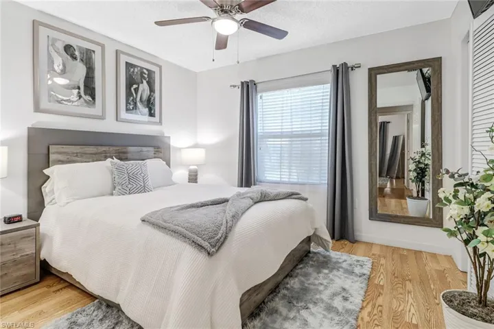 Bedroom with light wood-type flooring and ceiling fan