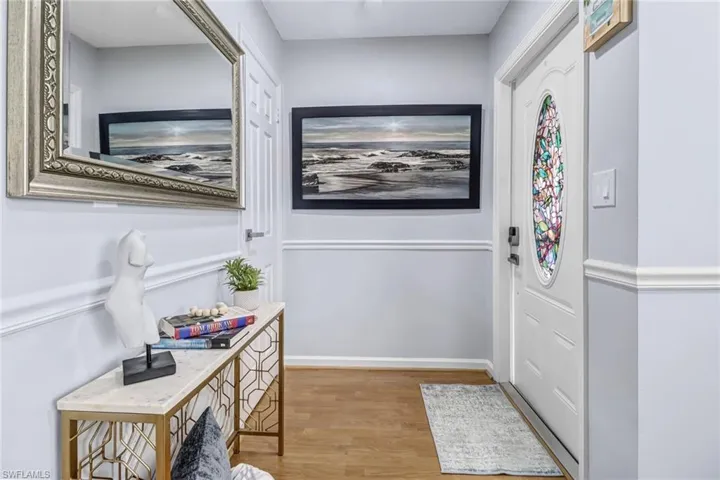 Doorway to outside featuring light wood finished floors