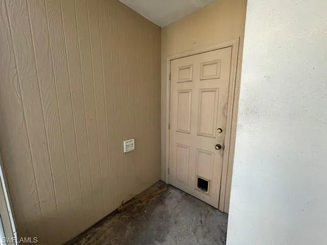 Front screened porch and door to garage