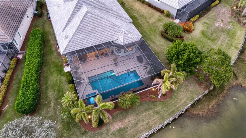 Aerial perspective showcasing the home’slakefront lot and privacy