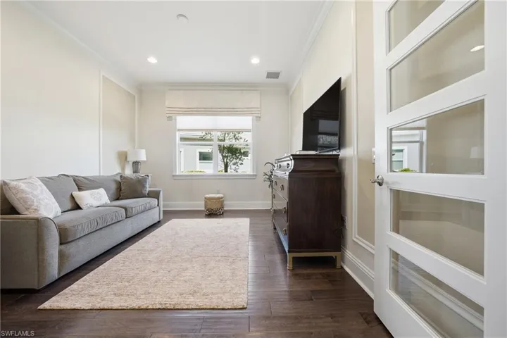 Well-appointed den with quiet separation frommain living areas