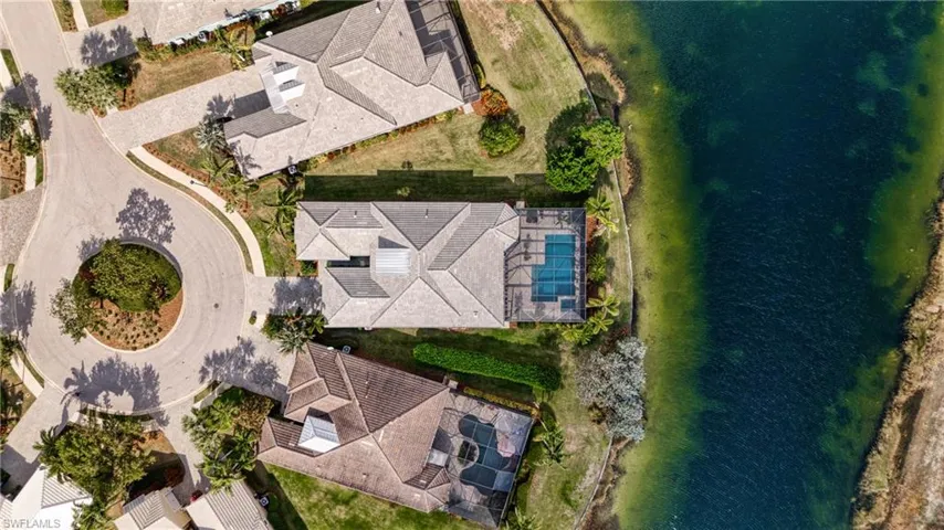 Aerial view highlighting lakefront setting andprivate cul-de-sac location