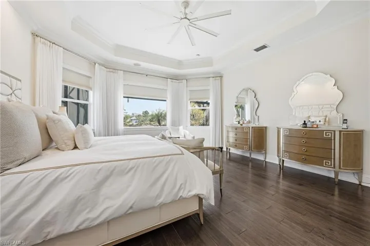 Private primary suite with peaceful lake views