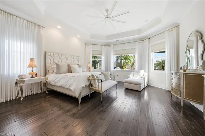 Private primary suite with peaceful lake views