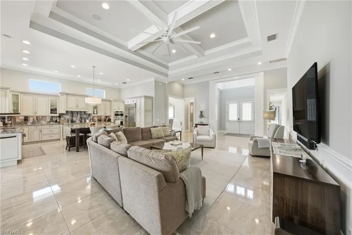 Refined finishes and custom millwork throughoutthe main living area