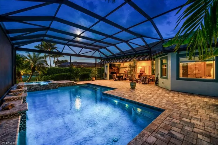 Lakefront luxury home in Isles of Collier Preservewith custom pool and spa
