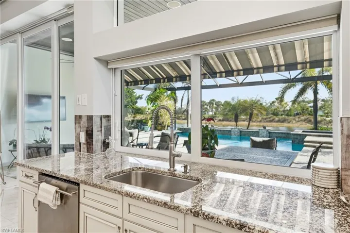 Kitchen sink overlooking pool and lake foreveryday enjoyment