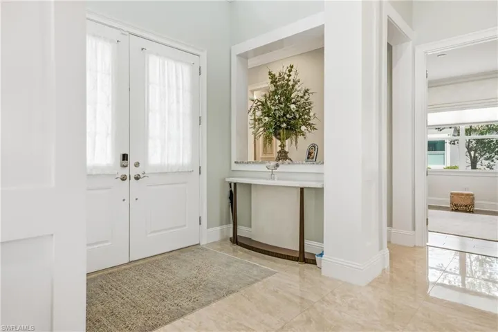 Light-filled living space with marble