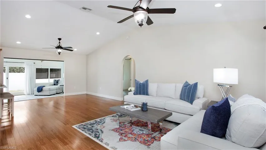 Recessed lighting and natural light create an inviting ambiance