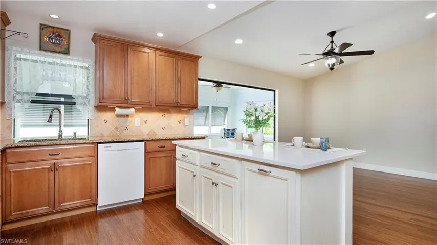 Custom cabinetry with pullouts on island