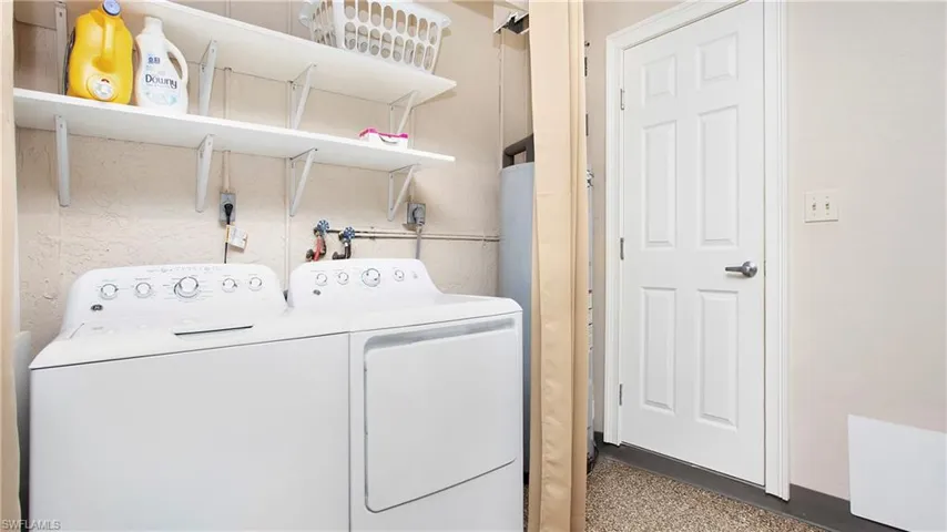 Washer and Dryer in garage off of master bathroom