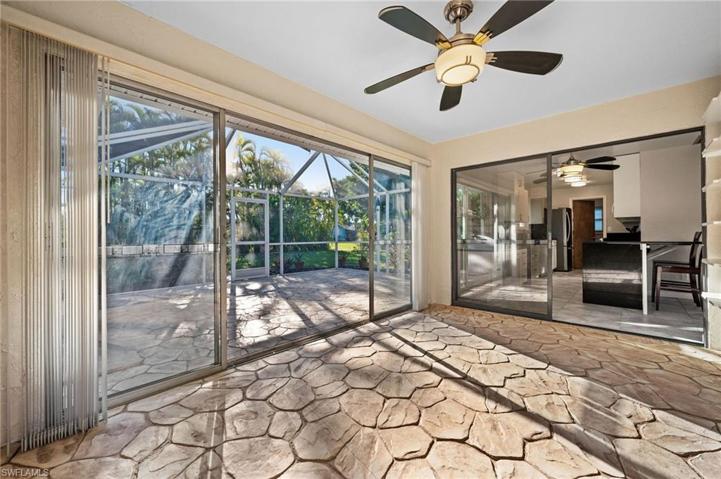 Air conditioned Dinning/ Sitting area with a view and access to the screened in porch.