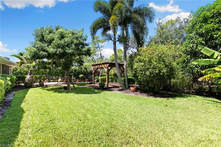 View of yard with a pergola