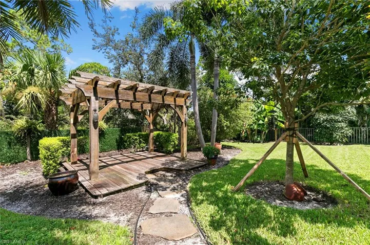 View of yard with a pergola