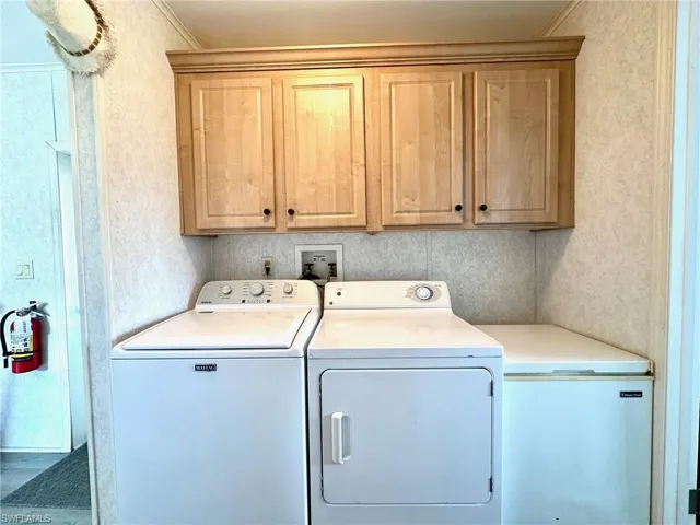 Laundry area with storage