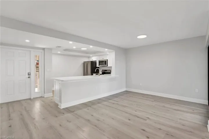 Looking into your dining room and kitchen from Family room