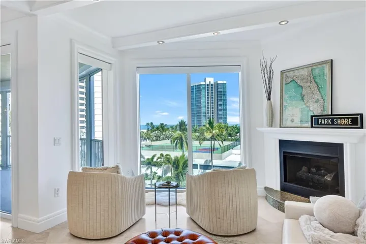 Family Room with Gas Fireplace and Gulf and Sunset Views