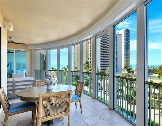 Expansive Lanai / 1 of 3 /  overlooking Gulf, Park Shore with Sunset Skies