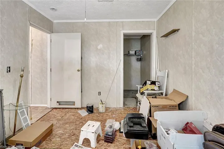 Guest bedroom 2. Carpet has been pulled up.